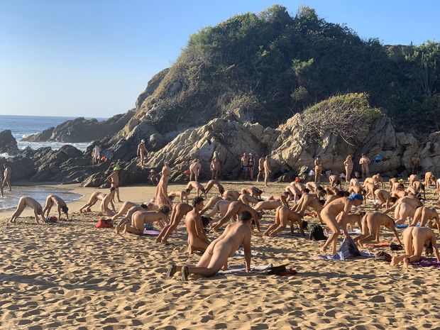 Naked exercise on the beach
