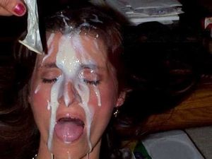 Woman empties a Fully Loaded Condom on her Face