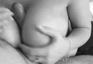 Sucking between big titties