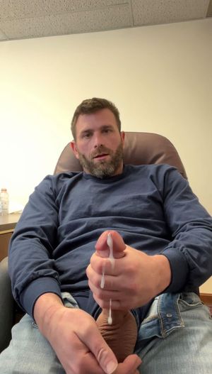 Stroking it at work! What if you walked in on this?