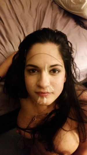 Brunette amateur with big tits with a facial