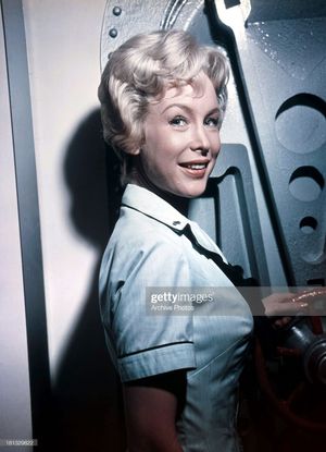 Worthy of being assigned next to her.