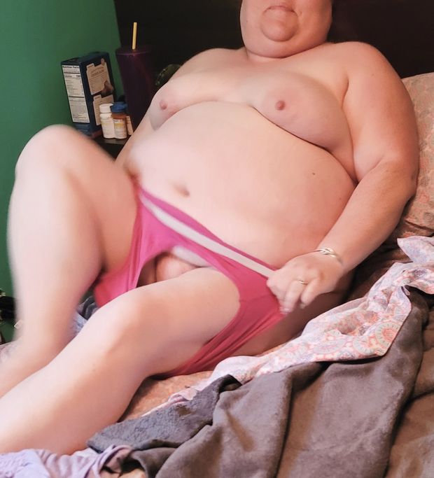 BBW in bed pulling on her underwear
