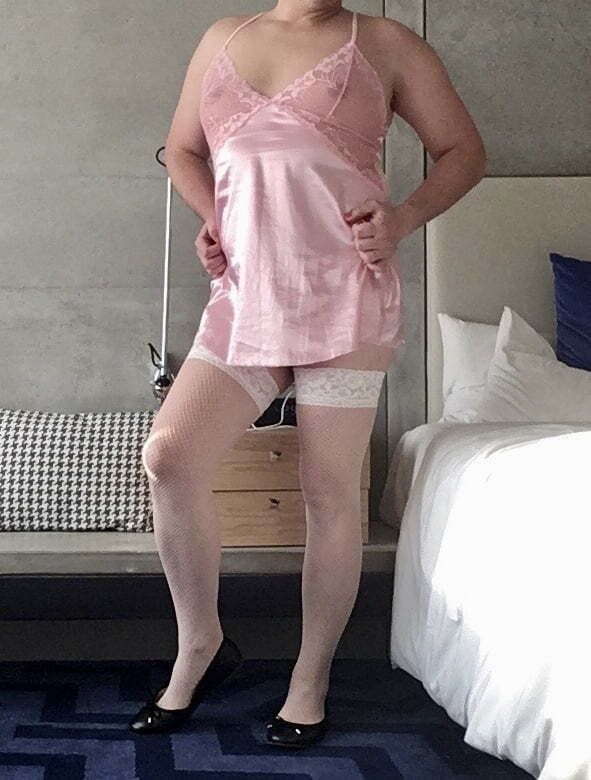 Sissy is looking good in her pink satin nighty