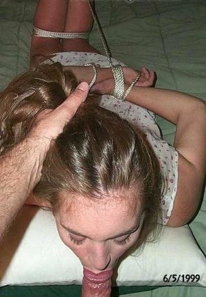 Brunette amateur tied-up sucking some dick