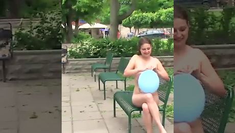 Completely naked bustie girI walks through the streets