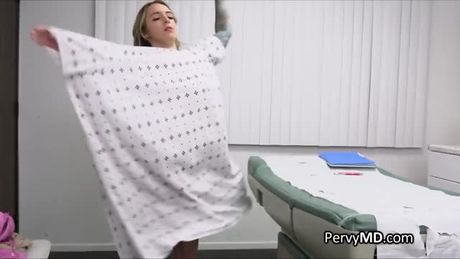 Doctor testing busty inked surrogate patient