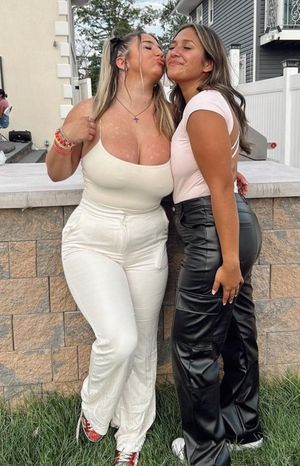 Jolie getting kissed by friend