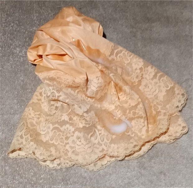 What is all over that Lacy Slip?