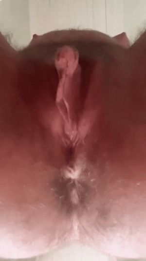 Spreading g her lips