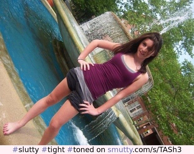 Slutty lil teenslut poses seductively by the fountain side