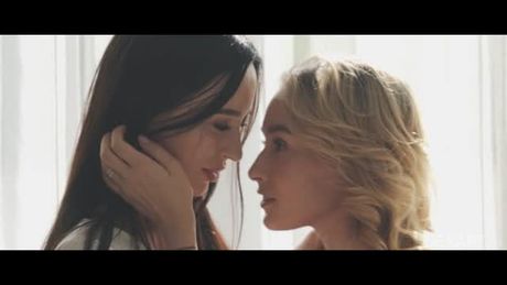 Two hotties have lesbian sex by the window