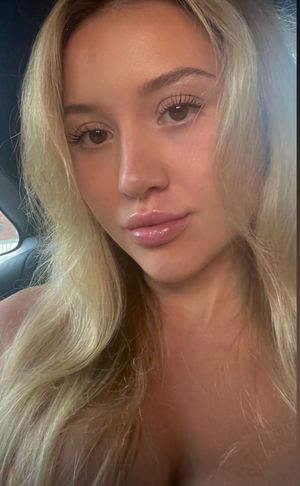 Claire selfie looking forward in car