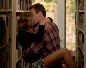 pushing against the bookshelf