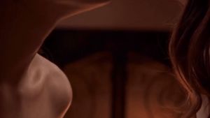 Fireplace lesbian kiss