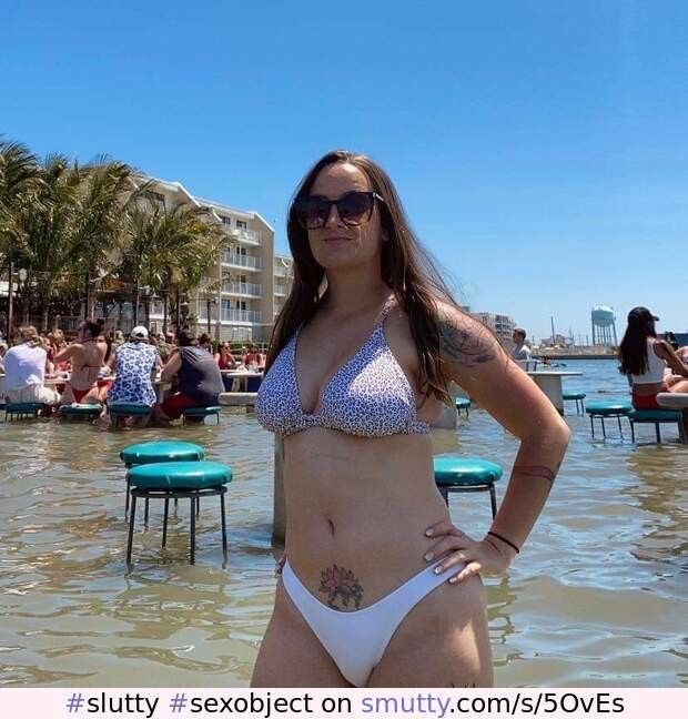 Slutty lil sex object posing in the water for the camera