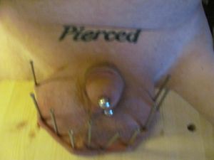 Having Balls Nailed at a Femdom party to please Mistress...