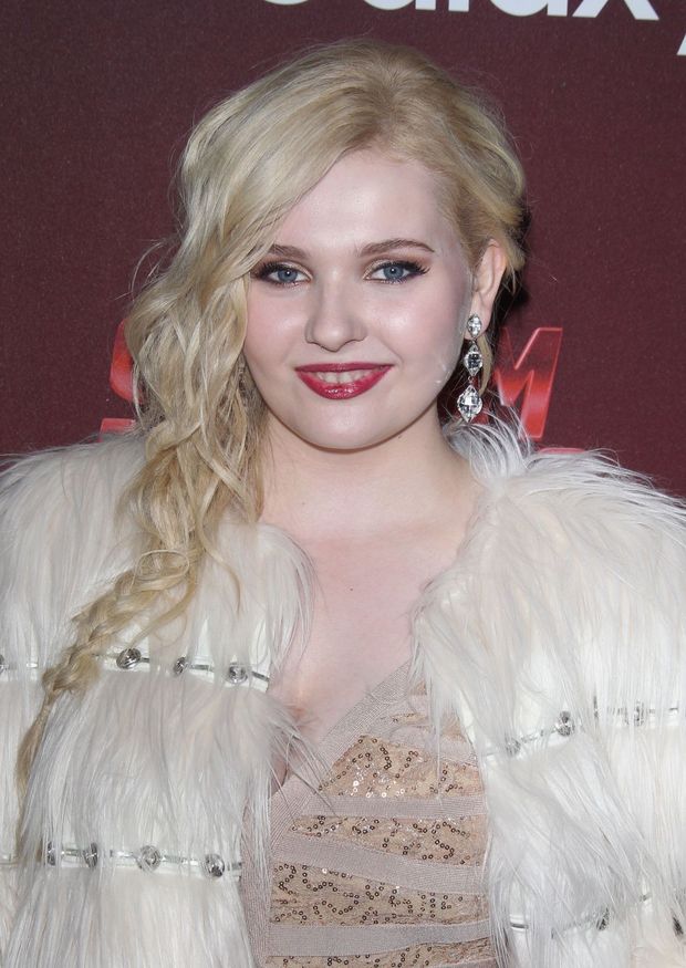 Can see a hint of cleavage.