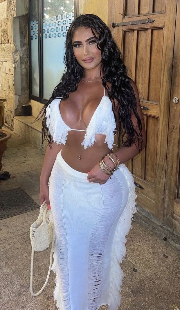 Ms. Foster in white