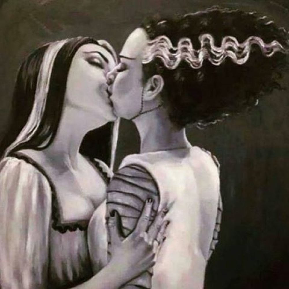 When Witches meet.  A tongue-kiss and a hello with a wicked smile