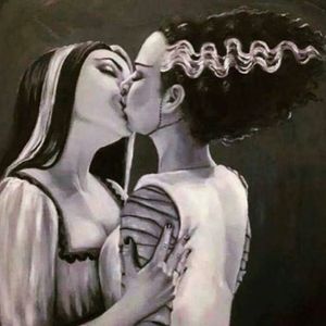 When Witches meet. A tongue-kiss and a hello with a wicked smile