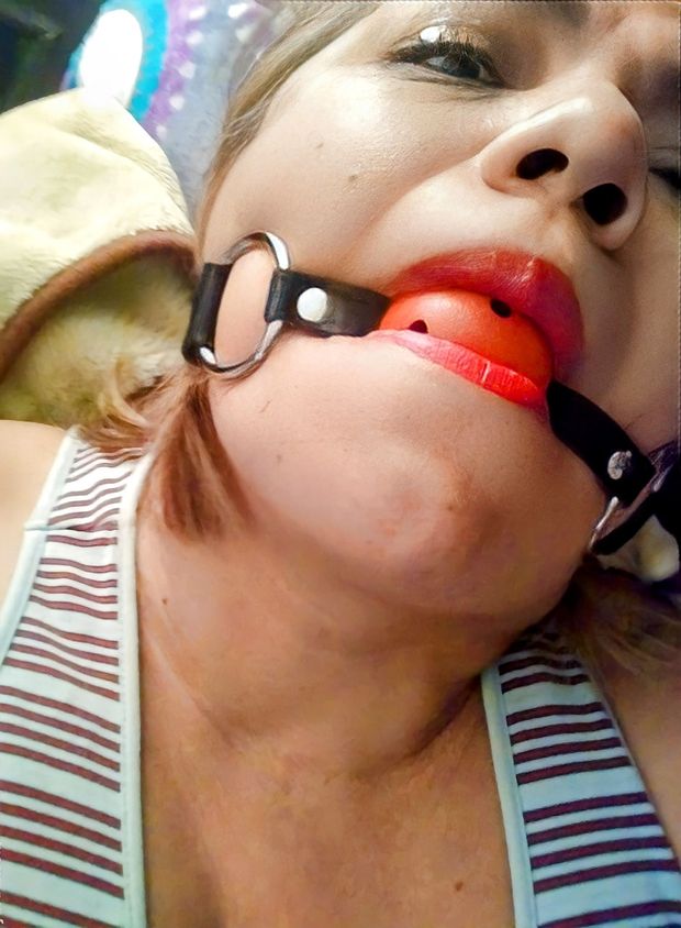 Ballgaged and humiliated  busty mexican mom sex slave Maricarmen J. Mendezz lost her rebel stare, awaits for her next session with Lupita.