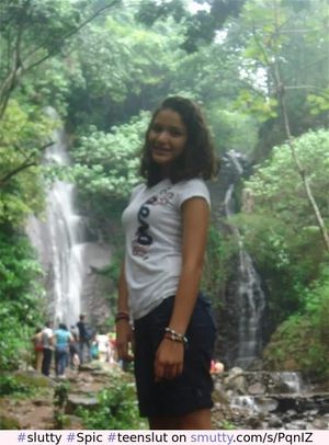 Slutty lil Spic teen slut posing seductively outdoors