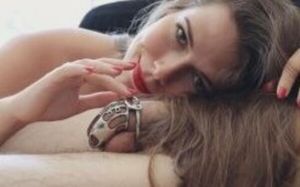 Ok, the cage is stupid. But her face, her hair, her fingertips…. So sexy!