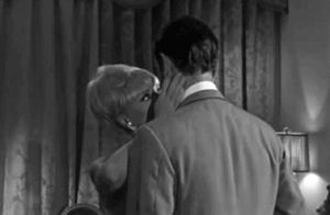 Beautiful woman in pretty bra slaps him good. I would ask for more of the same, please!