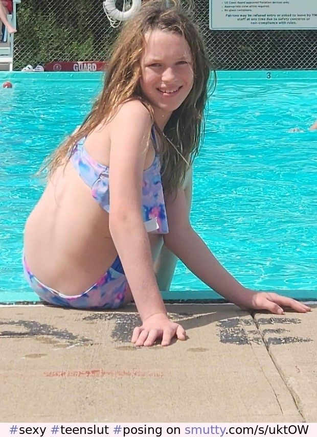 Sexy lil teen slut poses in a bikini poolside