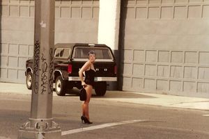 Sandy Ward is walking the streets to make a few extra dollars.