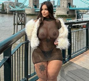thick brunette in sexy transparent dress
