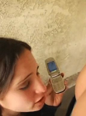 Amber Rayne calls her mom while eating ass