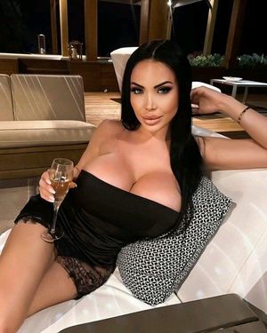 Pretty busty Latin brunette...