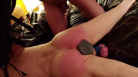 Plugged and spanked.