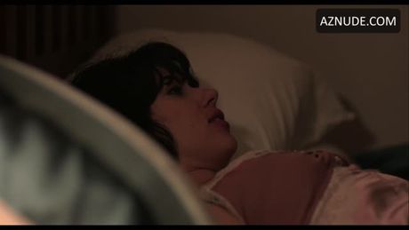 Getting intimate on the bed.