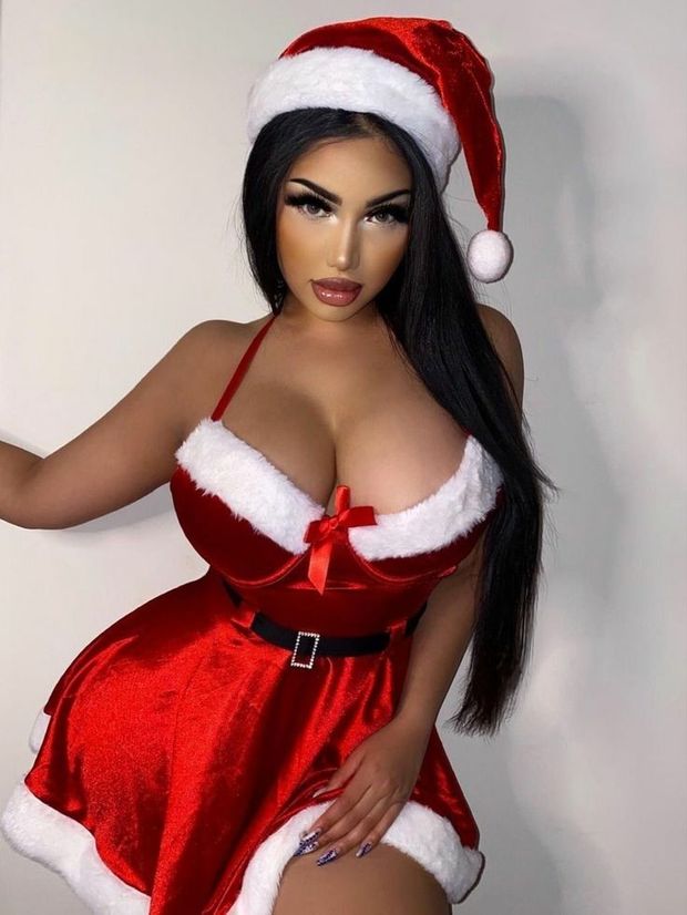 Pretty busty Latin brunette cosplay Santa...