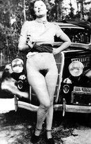 She keeps the car shining by rubbing her hairy snatch all over it!