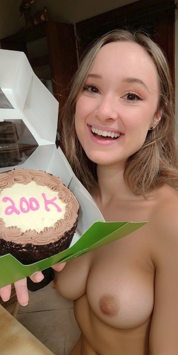 Amy Kay ASMR celebrates a Youtube subscription milestone with cake and nudity
