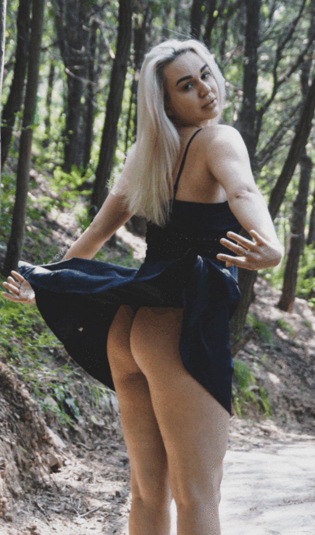 Blonde flashing in the woods