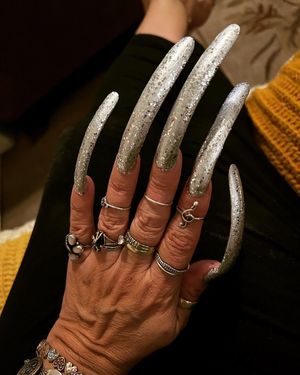 Shiny & metallic with glitter. Post your true rate.