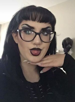 Goth chick with claws.