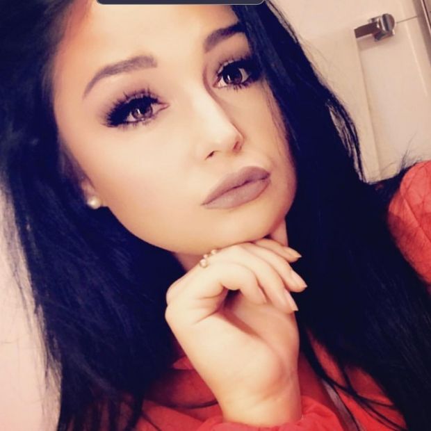 She has got the wow factor & her nails, too. Post your true rate.