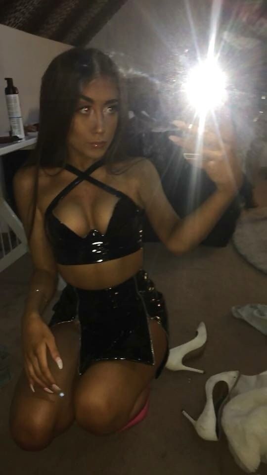 Broad in sexy outfit. Nails are great, too. Post your true rate.