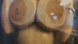 boobs rubbing against glass