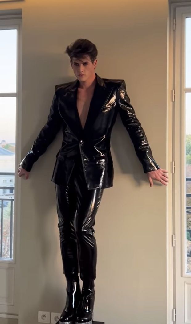 All dressed-up in a shiny suit .