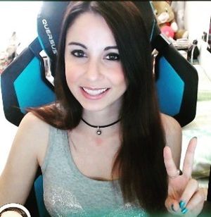 Kurolily doing the peace sign