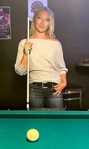 Pam playing pool