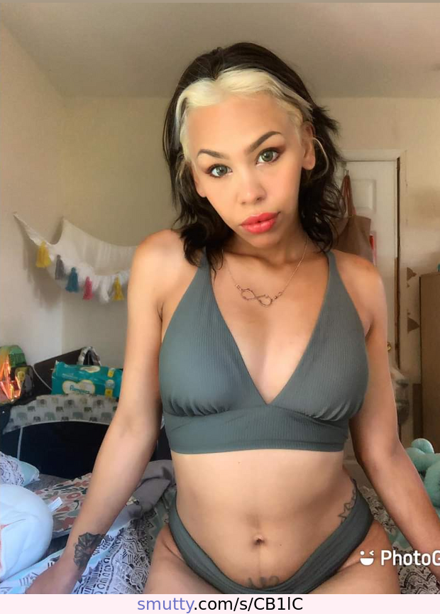 Slutty lil Spic Alyssa DeMarcello Zenquis poses in a bikini