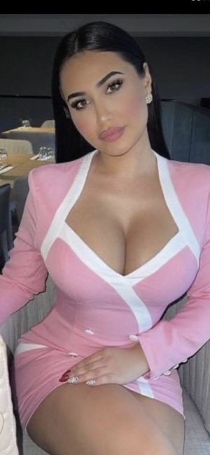 Pretty busty Latin brunette...